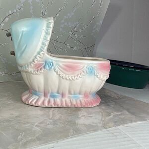 Inarco E- 3502 musical baby bassinet planter.